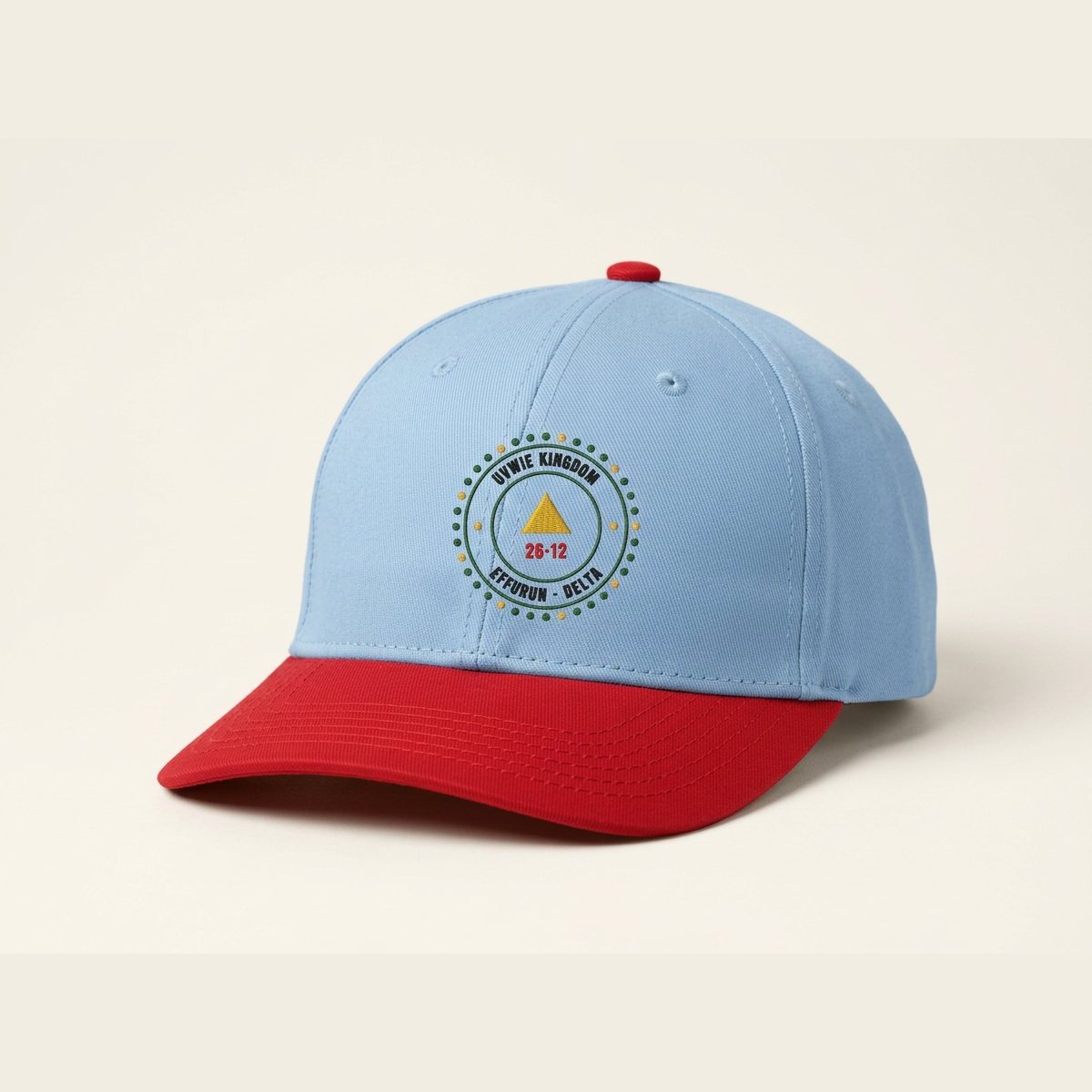 A six-panel cap with a sky crown, red brim and an embroidered crest.