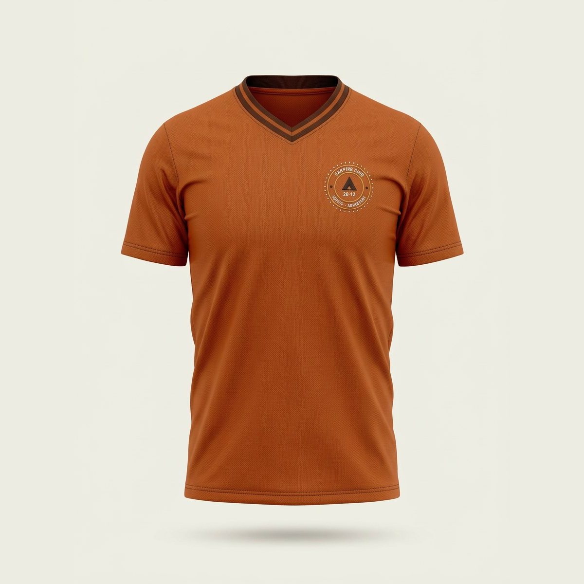 Burnt orange V-neck jersey with a crest on the chest.